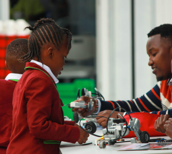 The Robotics program at Kiota School introduces learners to modern technology, engineering, and coding through hands-on experiences. It focuses on designing, building, and programming robots, helping students understand real-world technological applications.